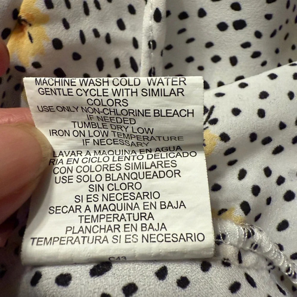 Lily White v neck top with black design with yellow flowers. Hi-Lo Size Medium - Picture 8 of 8